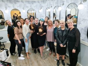 DAAT Signature Bootcamp graduates posing for a group photo